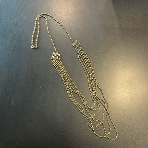 Bronze colored beaded necklace. 20” drop